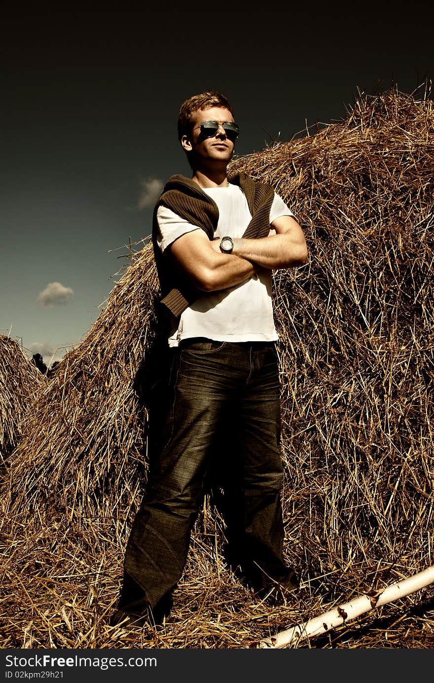 Magazine style photo of young men in the field.