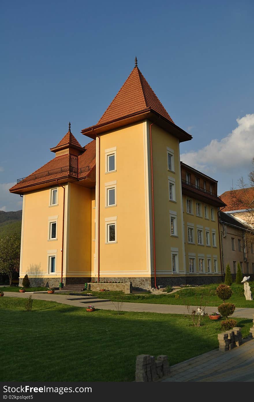 Beautiful building of medical corps on a background dark blue sky and clouds