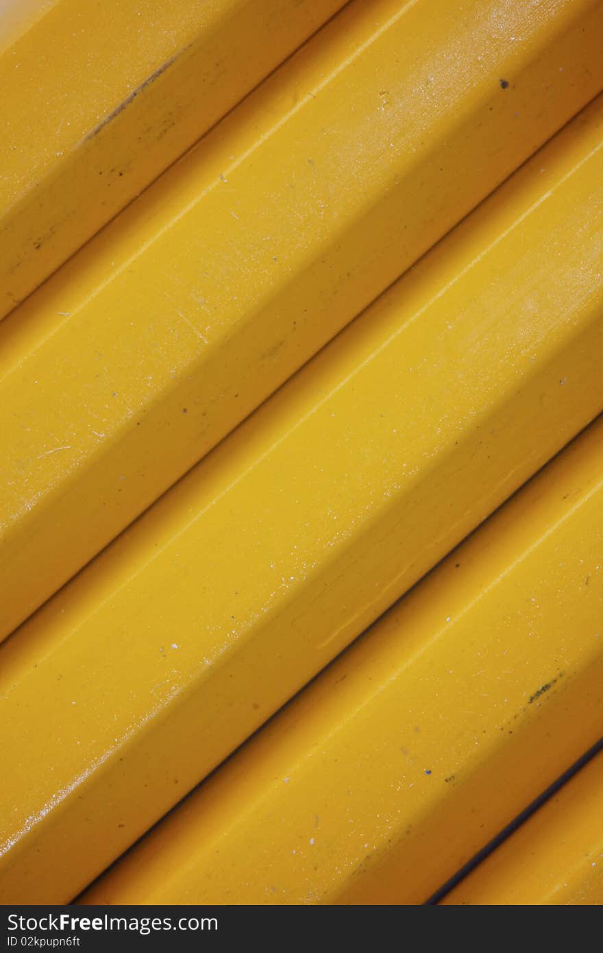 Abstract macro view of yellow pencils. Abstract macro view of yellow pencils