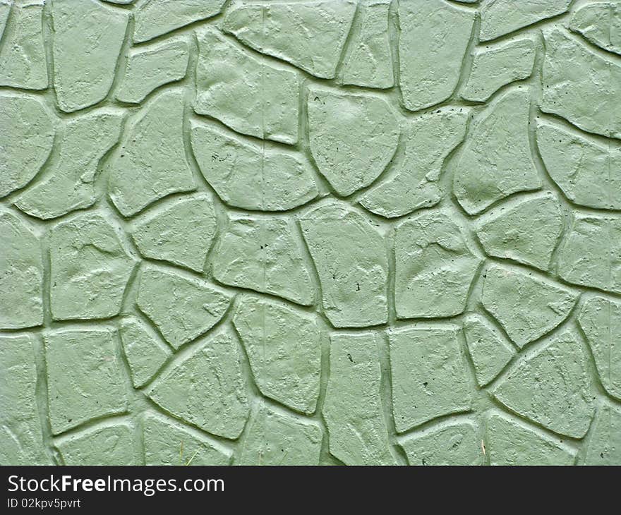 Concrete wall with faux stone pattern. Concrete wall with faux stone pattern