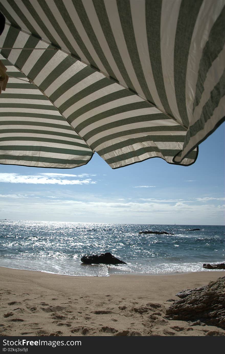 Beach view under the umbrella. Beach view under the umbrella