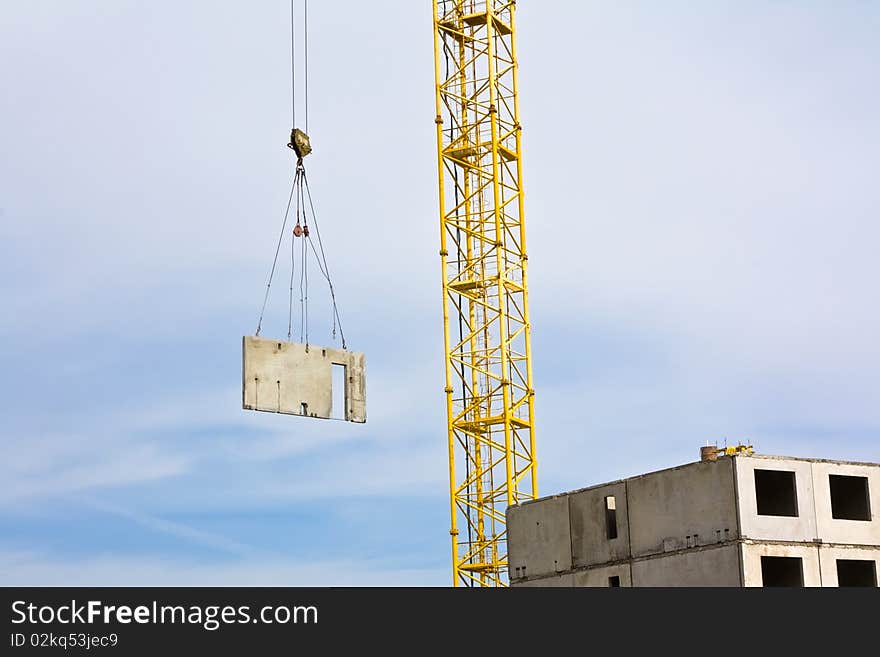 Crane over blue sky