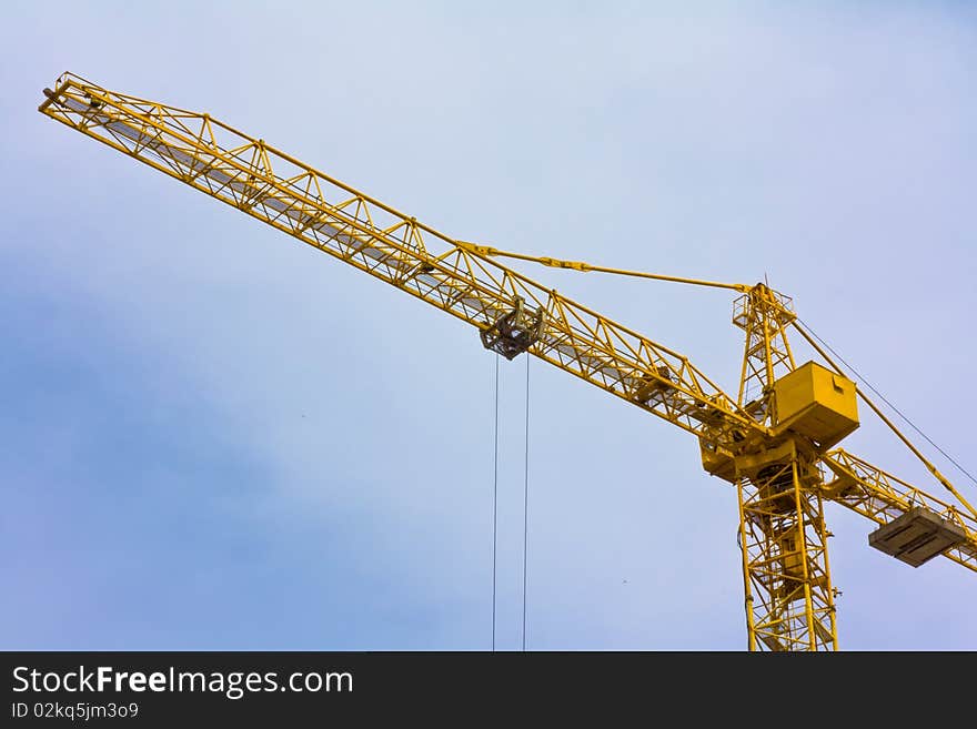 Crane over blue sky