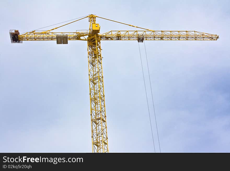 Crane over blue sky