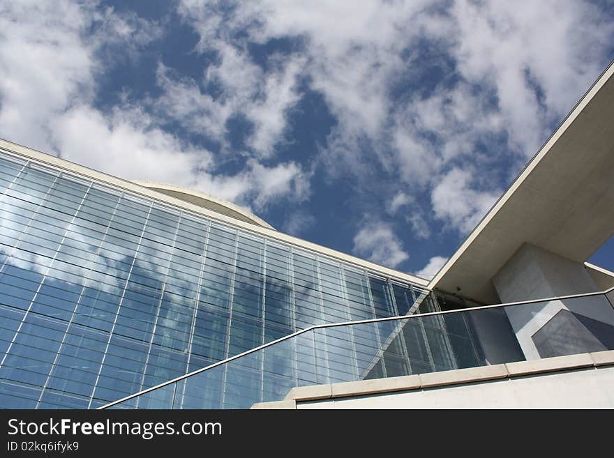 Office Building against the cloudy sky in the government district in Berlin, Germany. Office Building against the cloudy sky in the government district in Berlin, Germany