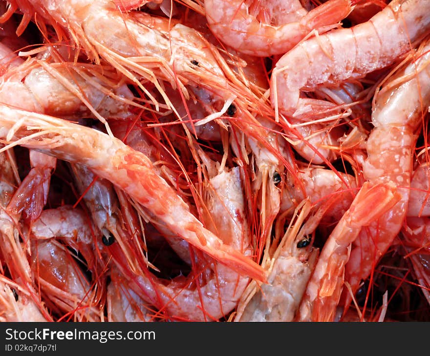 Fresh shrimps closeup background at the local market