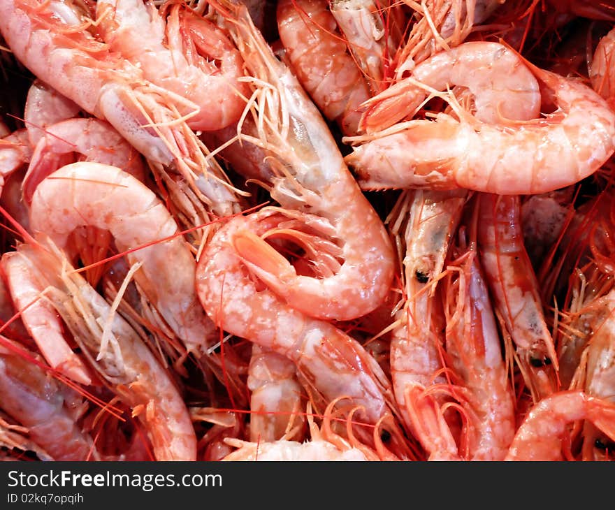 Fresh shrimps closeup background at the local market