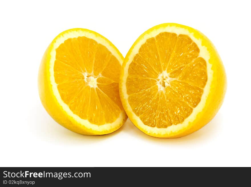 Fresh Juicy Orange Sliced in half isolated on a white background. Fresh Juicy Orange Sliced in half isolated on a white background