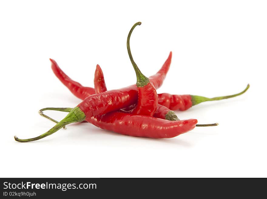 Whole Fresh Red Chillies isolated on a white background. Whole Fresh Red Chillies isolated on a white background