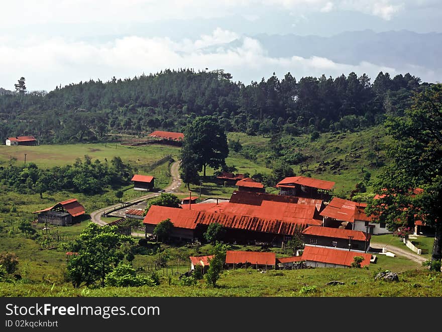 Farm with red roofs in the mountains of Guatemala. Farm with red roofs in the mountains of Guatemala