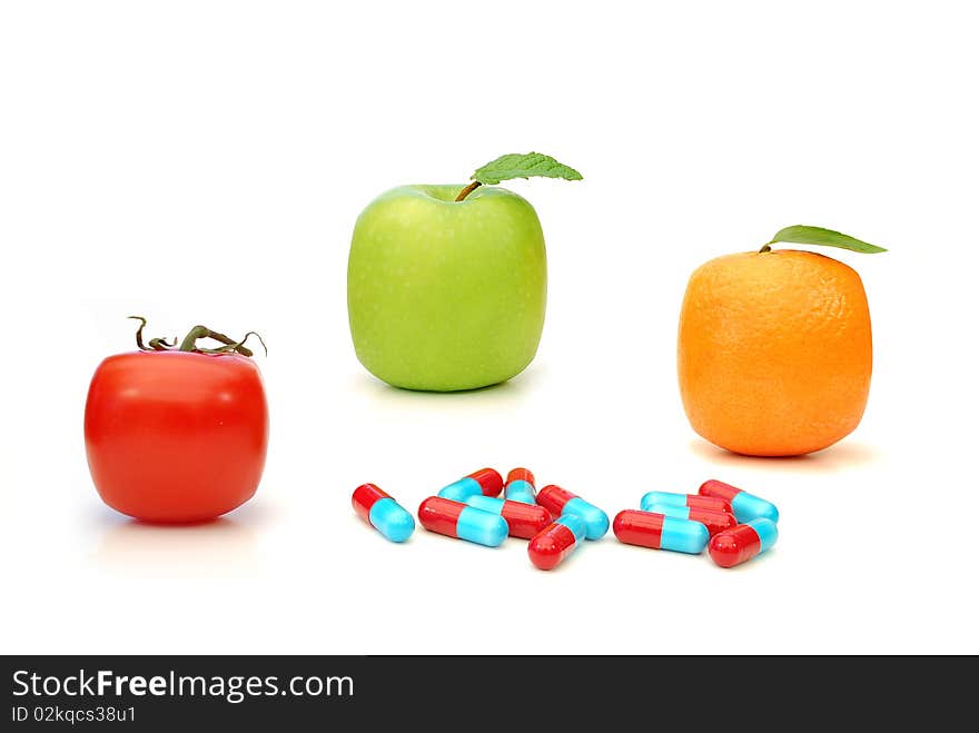 Square shaped fruit and vitamin pills. Square shaped fruit and vitamin pills