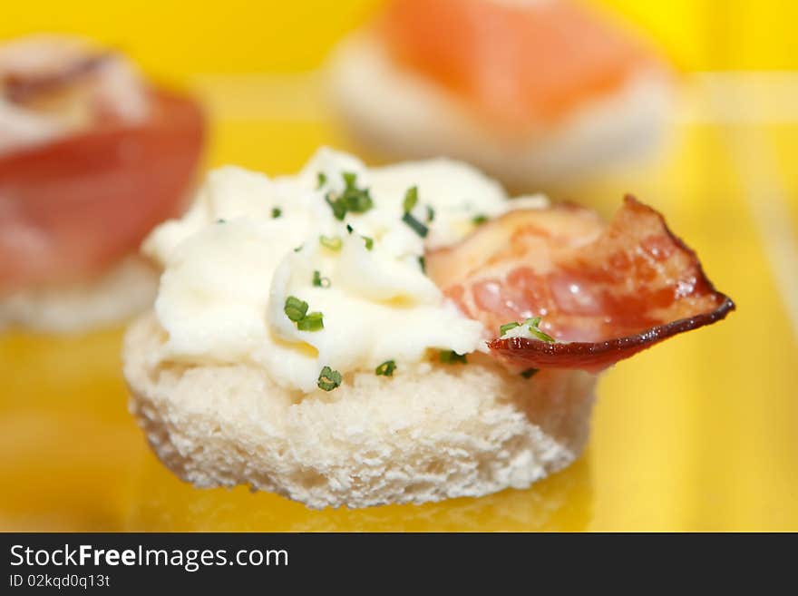 Festively arranged meat products in an plentyful ambient.