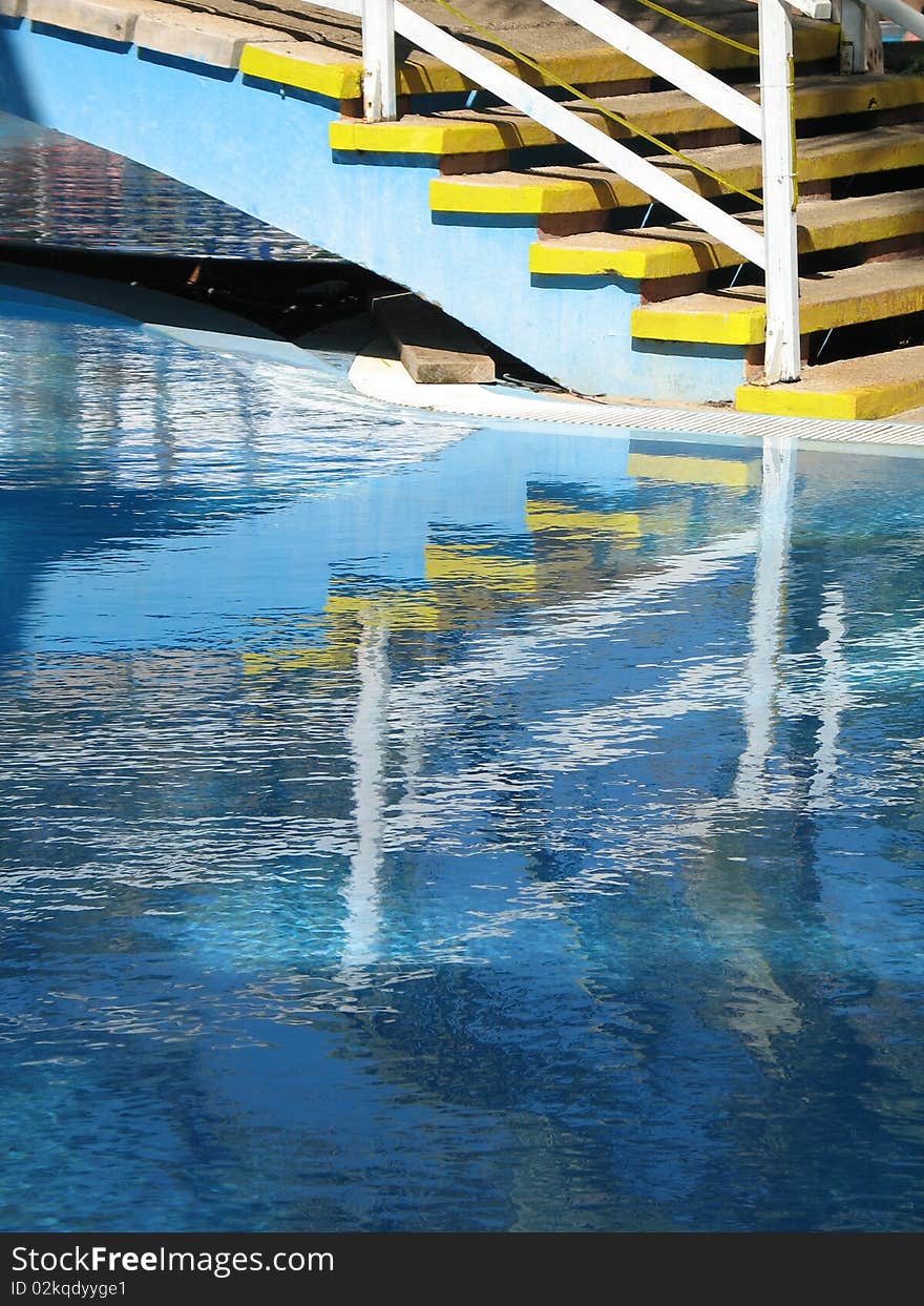 Stairs reflection in a pool