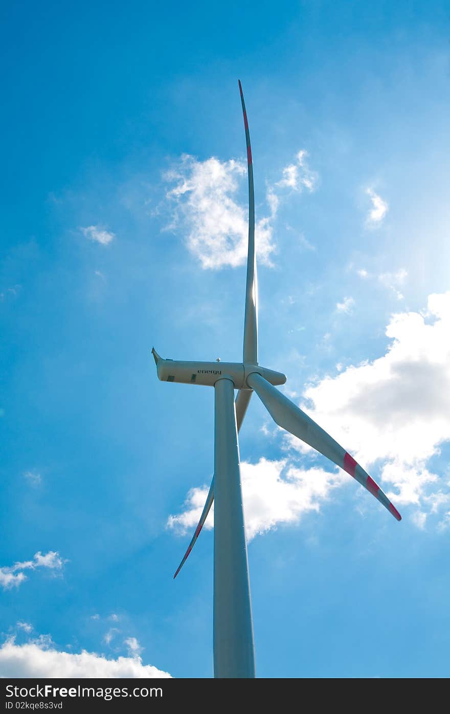 Wind turbines farm and clouds