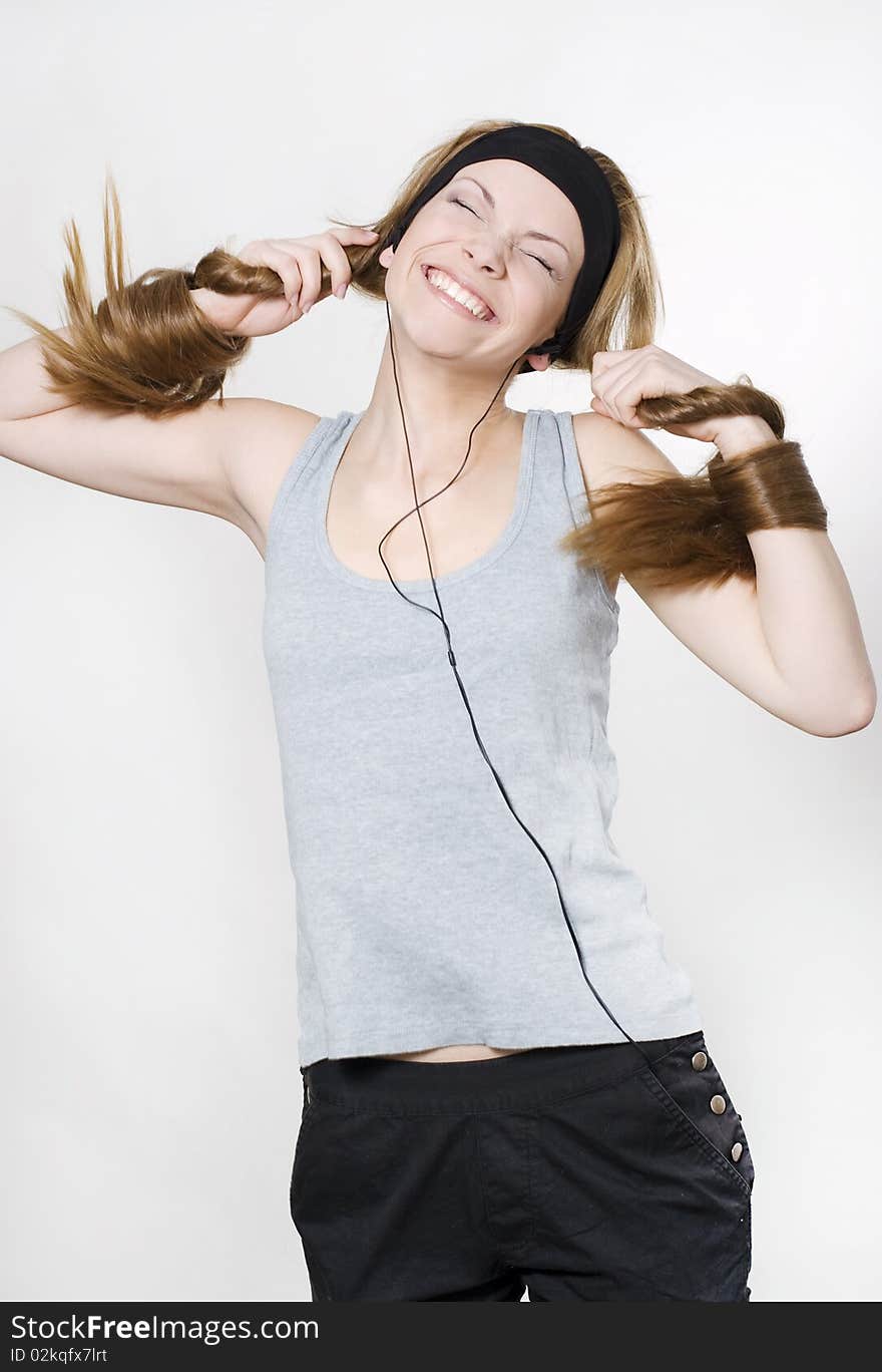 Woman listening music with headphones