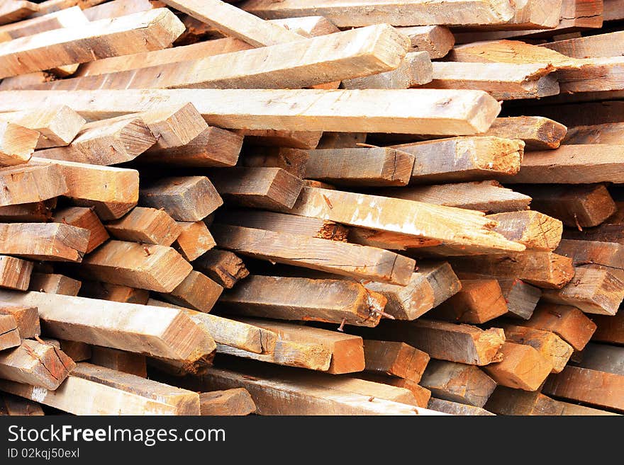 Pile of wood logs for build.