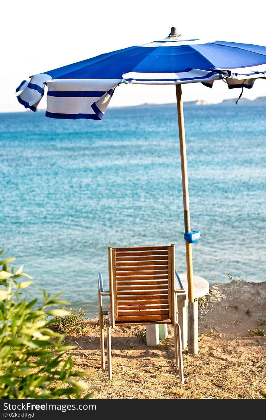 Chair and umbrella on the beach