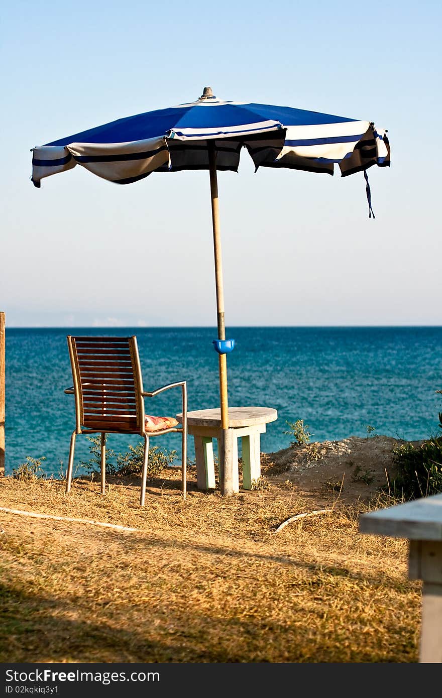 Chair and umbrella on the beach