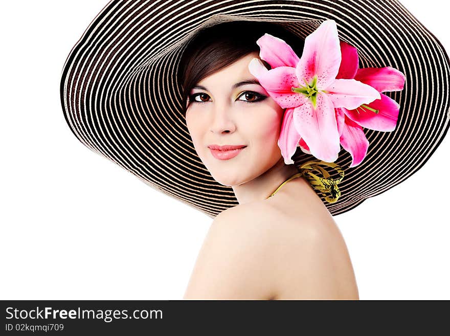 Shot of a young beautiful woman in elegant hat with a lily flowers. Isolated over white background. Shot of a young beautiful woman in elegant hat with a lily flowers. Isolated over white background.