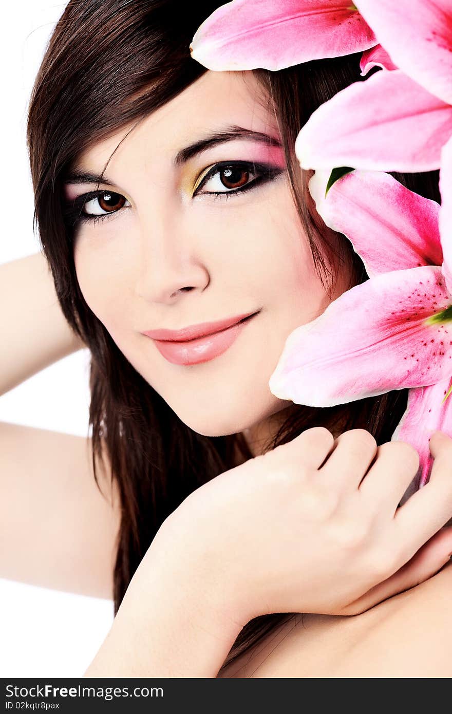 Shot of a young beautiful woman with a lily flowers. Isolated over white background. Shot of a young beautiful woman with a lily flowers. Isolated over white background.