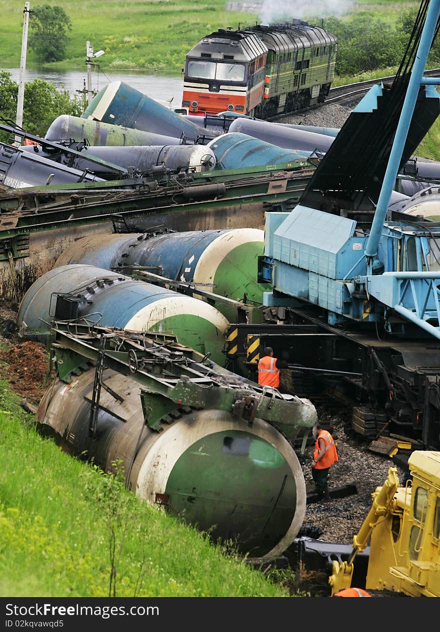 Wreck of railway tanks with black oil. Wreck of railway tanks with black oil