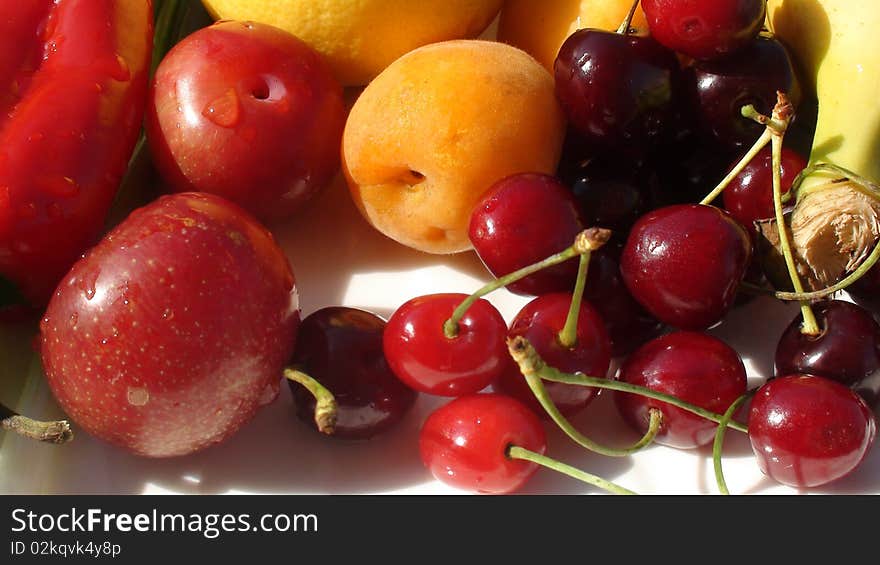 colorful fruits and vegetables on white background