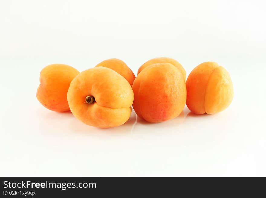 Apricots On A White Background