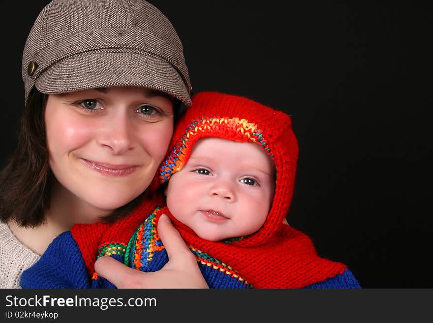 Beautiful brunette mother and her baby boy. Beautiful brunette mother and her baby boy