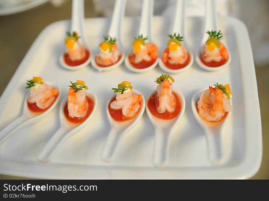 Shrimp in spoon at party