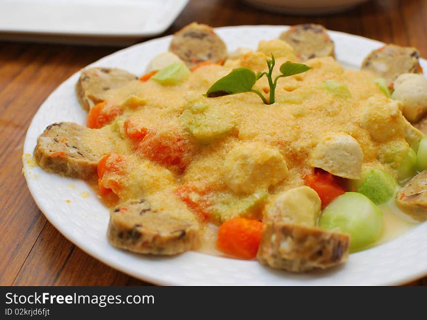 Chinese vegetarian dish topped with special vegetable sauce. Suitable for concepts such as diet and nutrition, healthy lifestyle, and food and beverage.