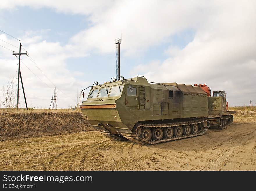 The caterpillar cross-country vehicle on a deposit