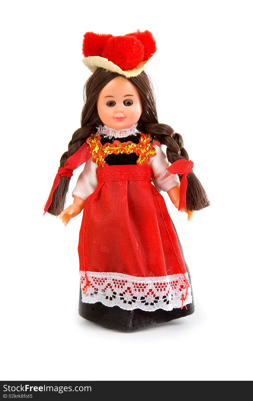 Doll in the German national costume on a white background