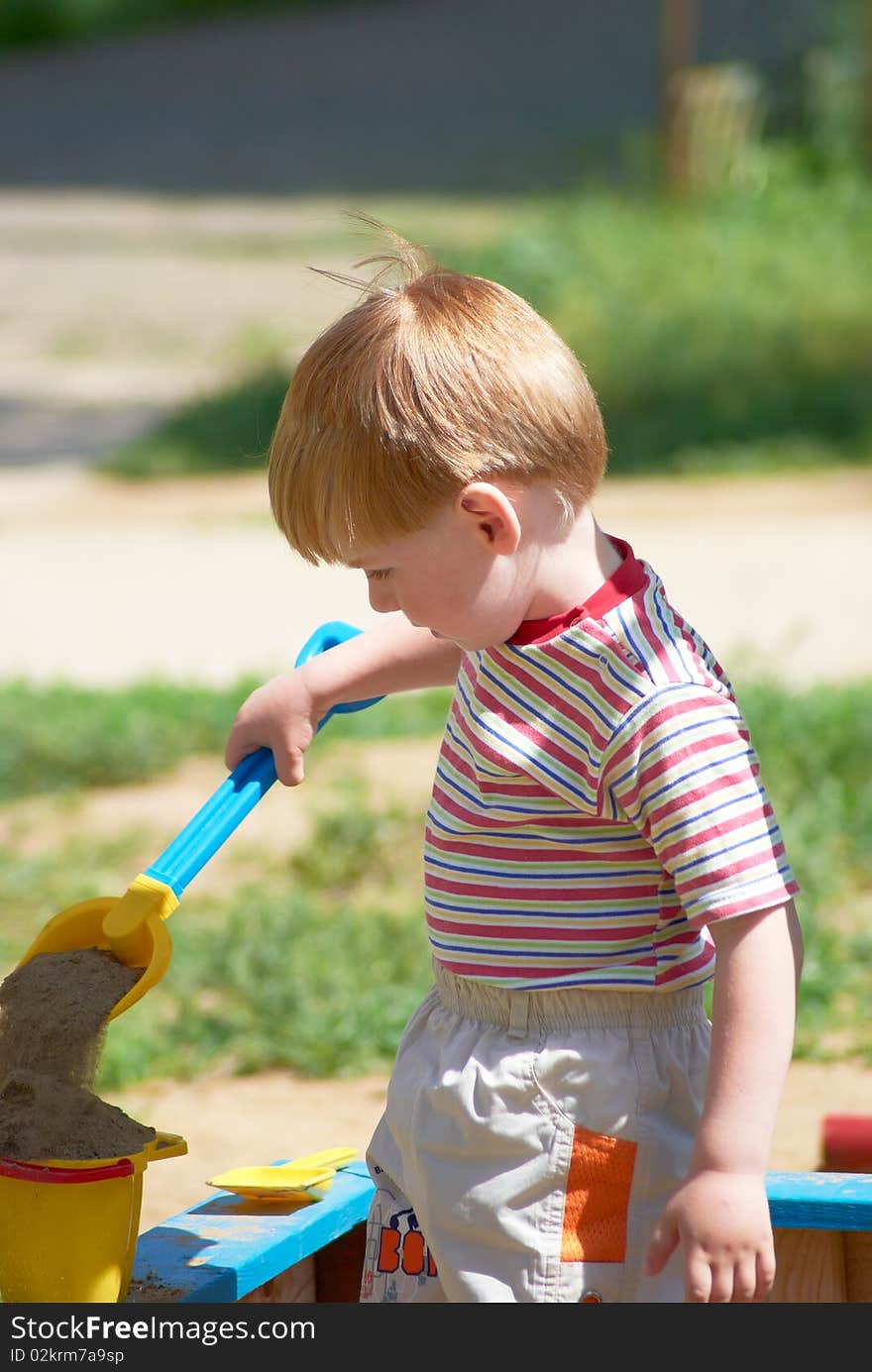 The little boy on walk in the summer. The little boy on walk in the summer