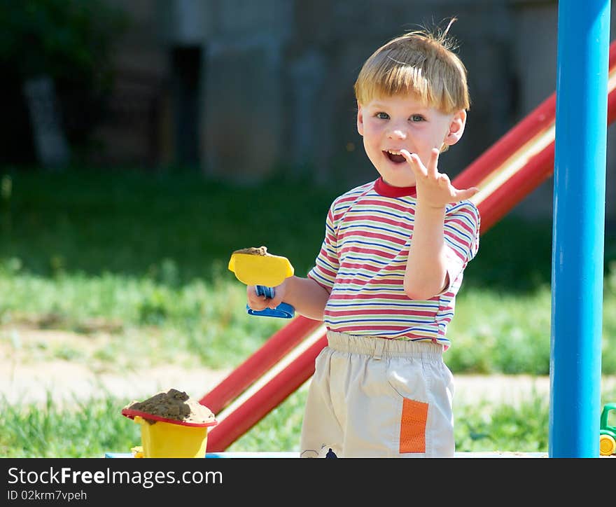 The little boy on walk in the summer. The little boy on walk in the summer