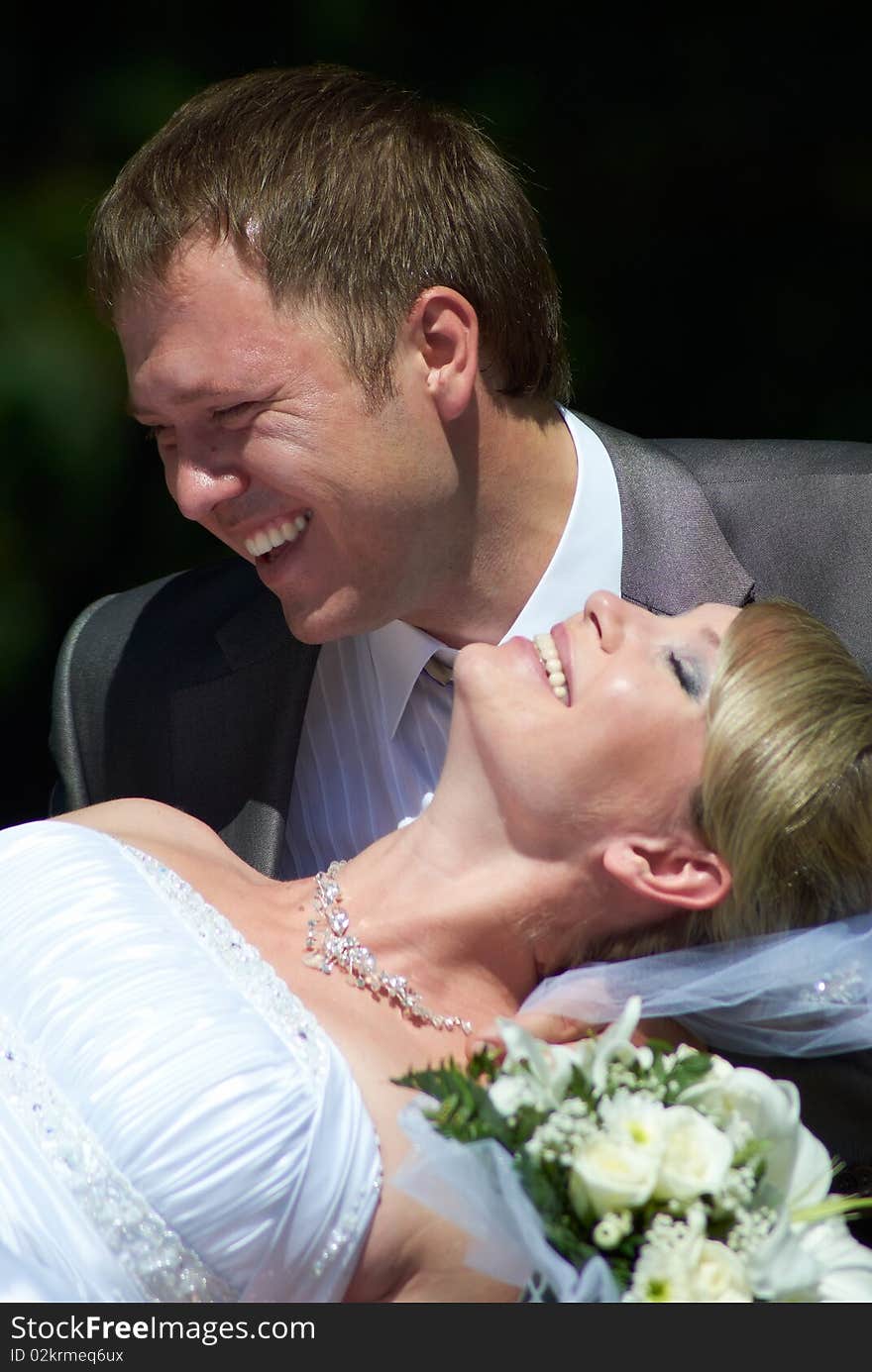 The groom and the bride in outdoors. The groom and the bride in outdoors