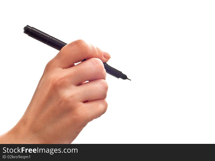 Woman's hand with black pen isolated on white. Woman's hand with black pen isolated on white