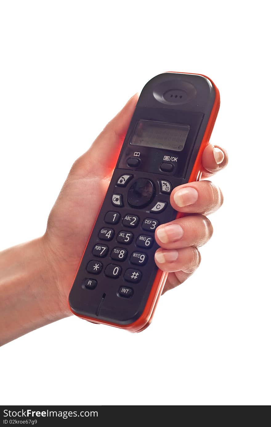 Studio photography of a woman's hand holding a phone. Isolated on white