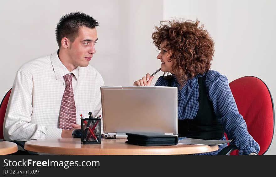 Business colleague talking in office