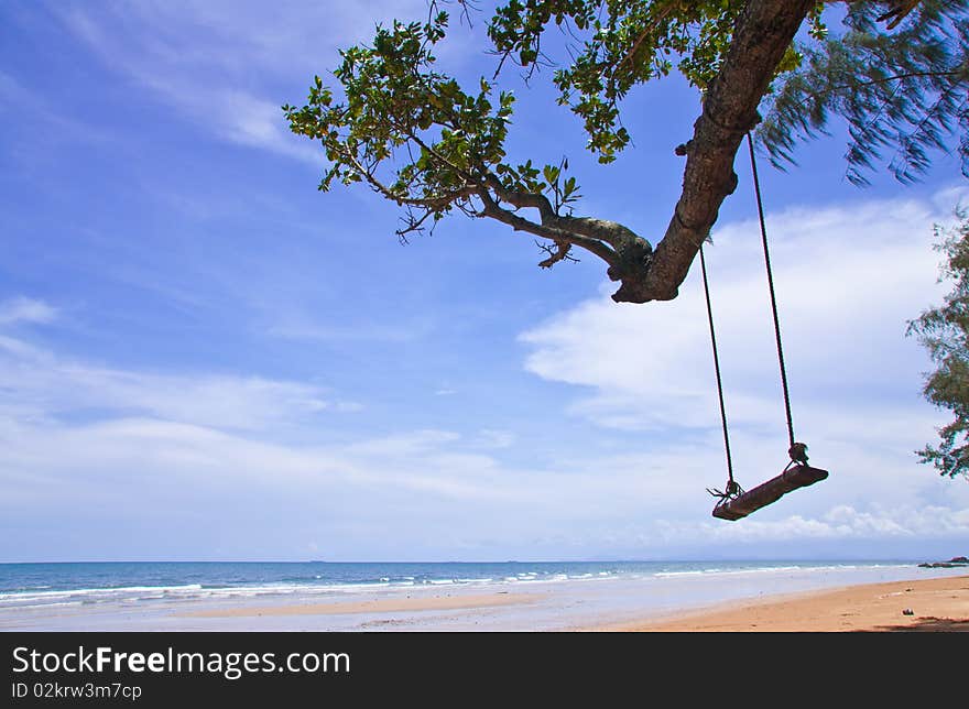 Wood swing on beach, east of Thailand