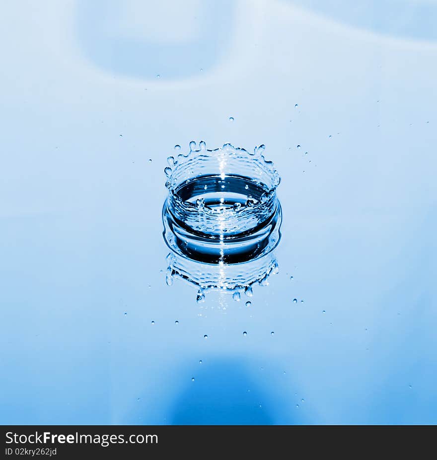 Blue water drop splashing background. Blue water drop splashing background