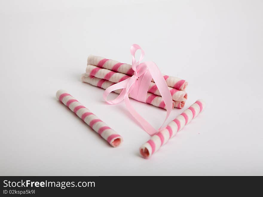 Pink cakes on grey background