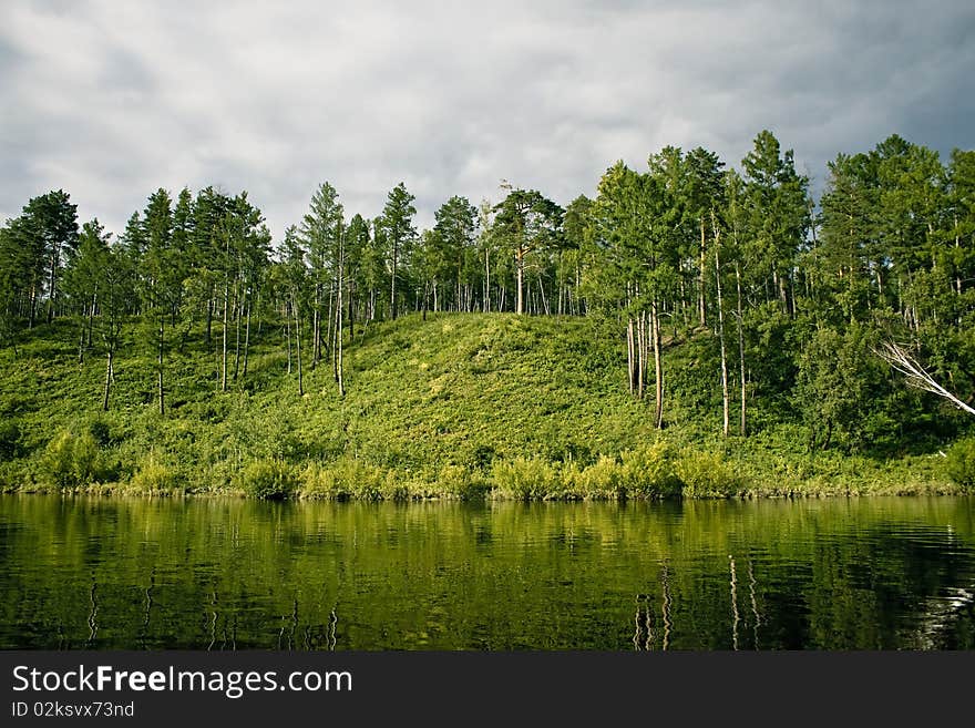 Green bank of Dep river, the Amur region, Russia