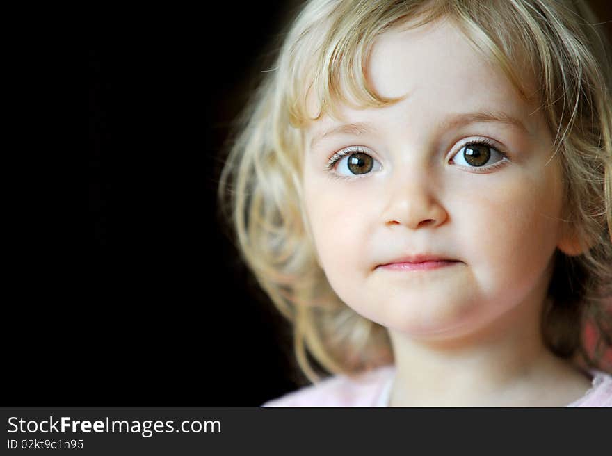 Portrait of lovely blond little girl