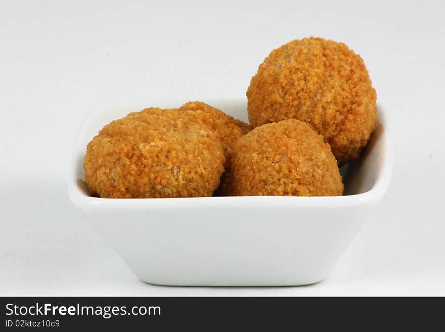 Scotch eggs in a dish