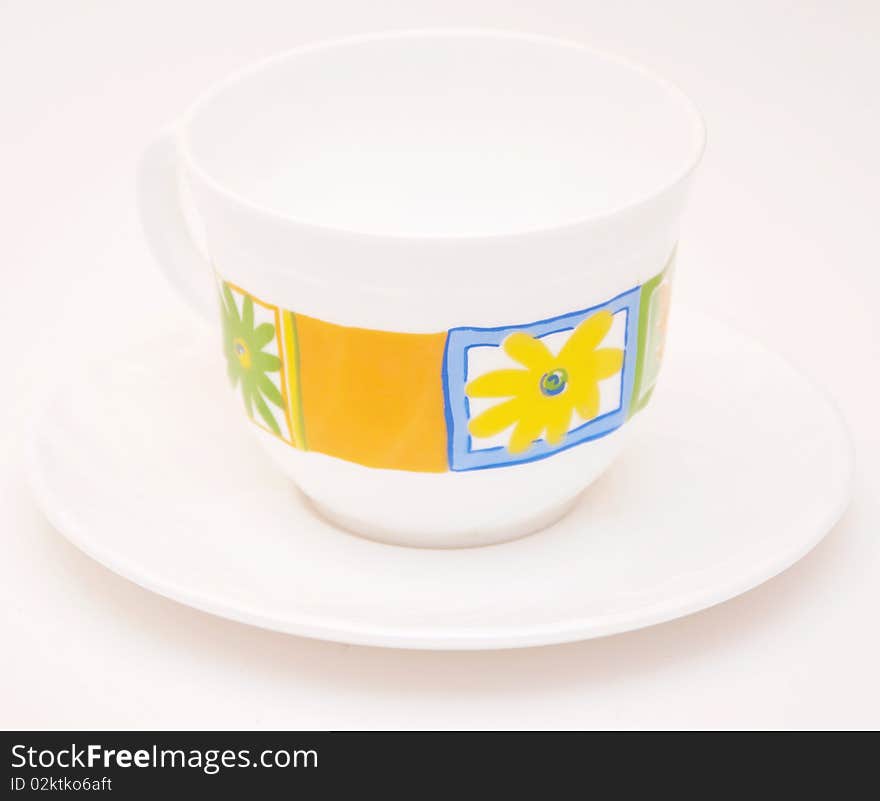 Empty tea cup saucer on white background