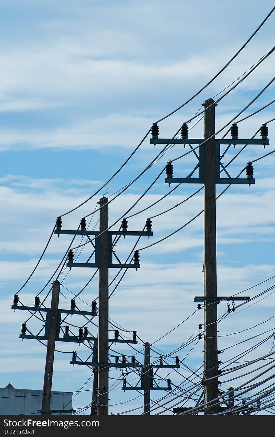 Electric tower on a blue sky background.