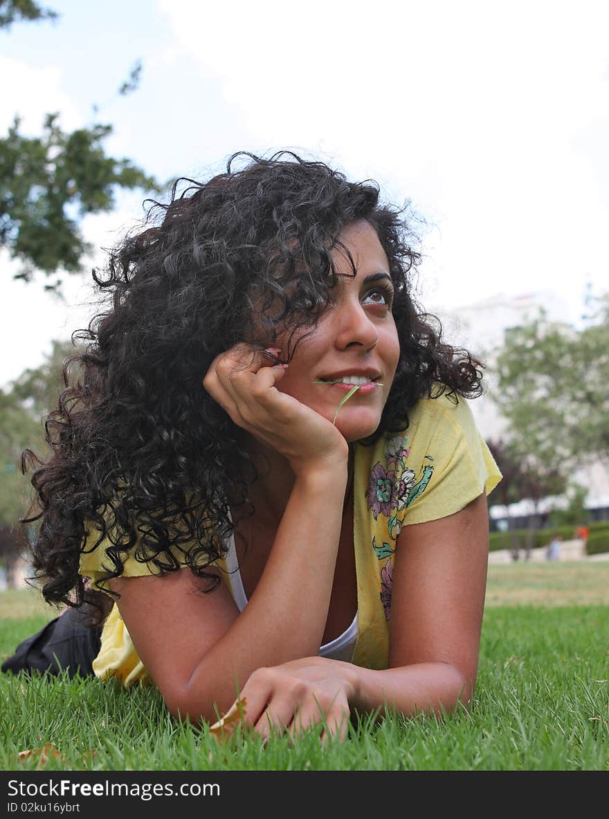 Young  girl lying on grass