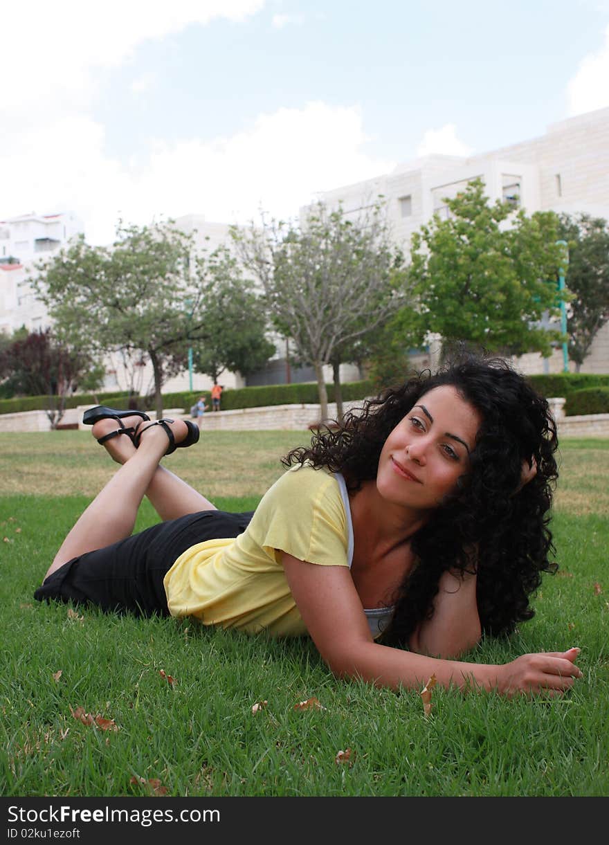 Young  girl lying on grass