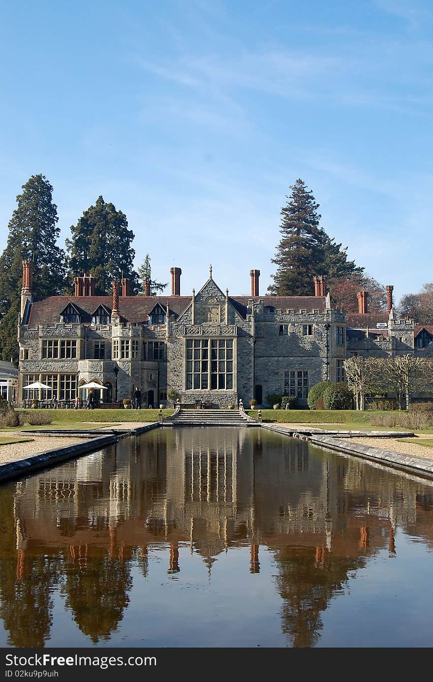 Traditional English country manor with ornamental pond. Victorian /Edwardian architecture. Traditional English country manor with ornamental pond. Victorian /Edwardian architecture.