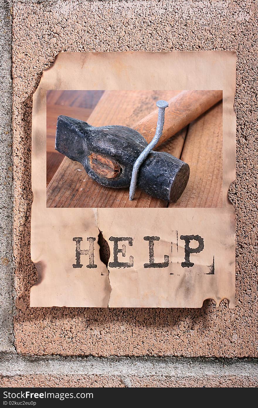 The concept of the request for the help, on the old announcement on a stone fence an illustration of a curve nail and a helpless hammer.